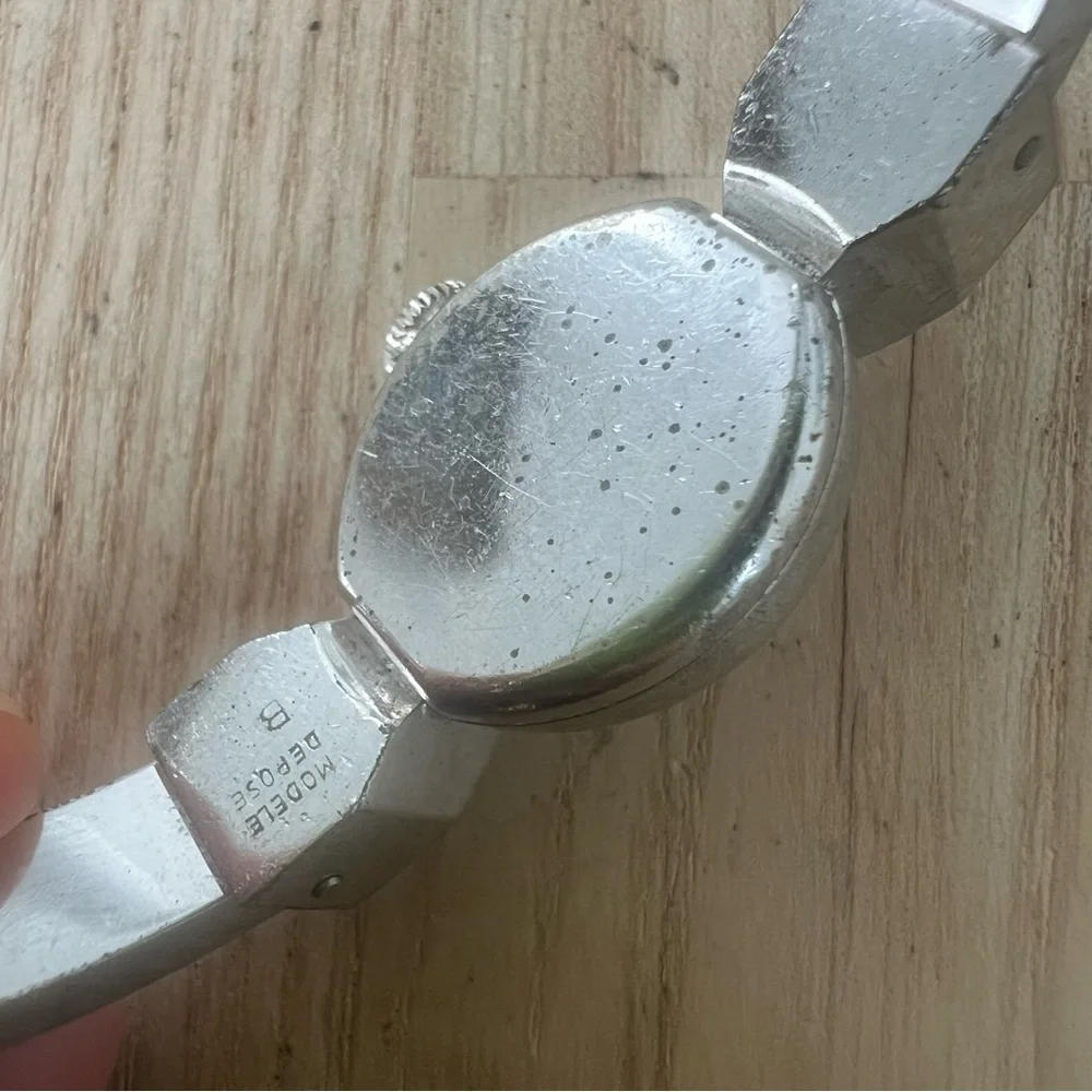 Vintage Sheffield ladies silver tone hinged cuff bracelet mechanical watch